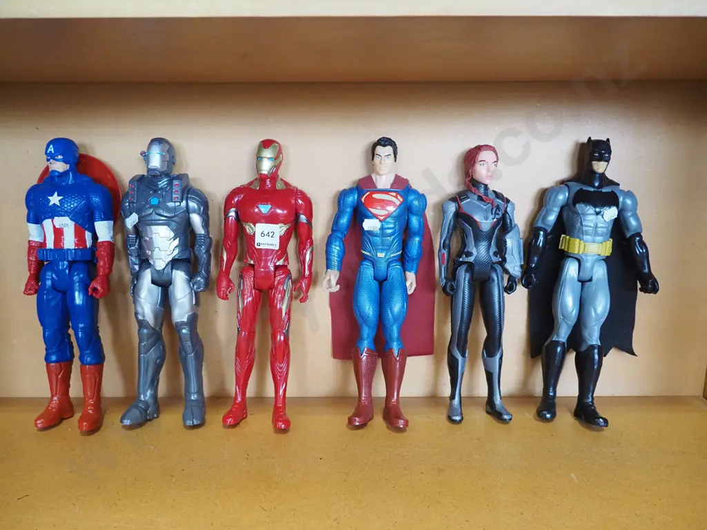 shelf of action figurines Image 1++