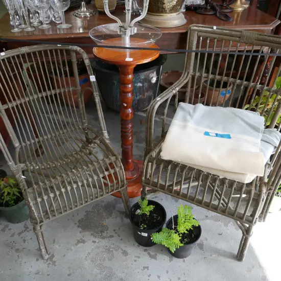 green painted cane patio chair