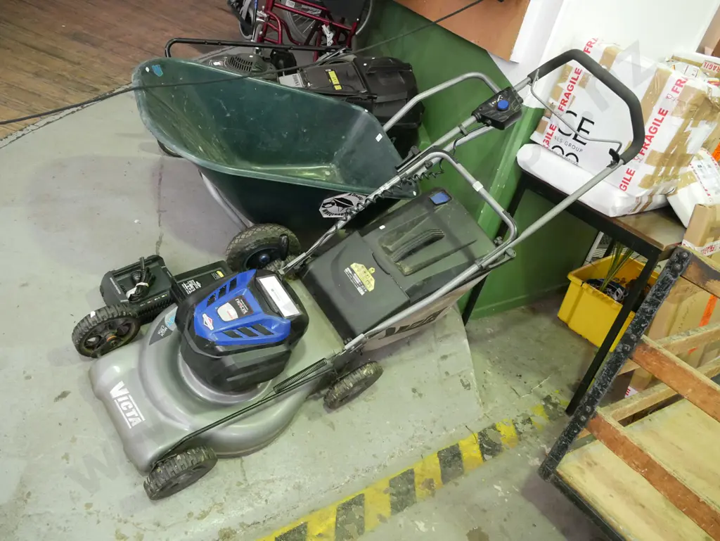 Victa 82V battery powered lawn mower with charger - battery in office Image 1++