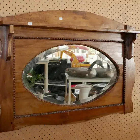 framed oval bevelled edge mirror with shelf
