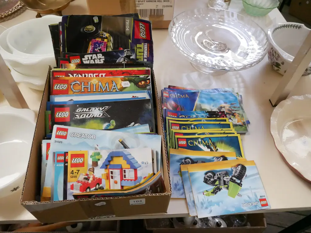 box of Lego manuals Image 1++