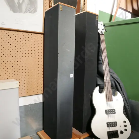 pair of Boland acoustic freestanding floor speakers - fading to 1 speaker 