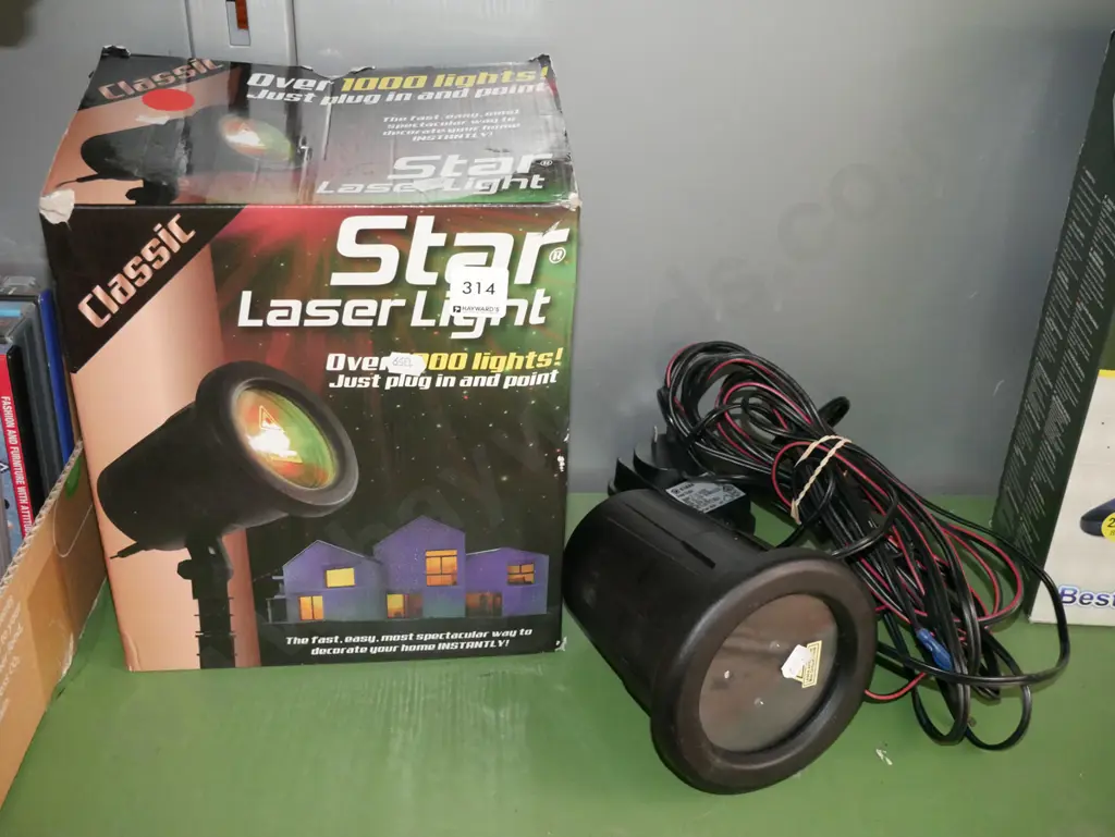 Star, Laser Light in original box Image 1++