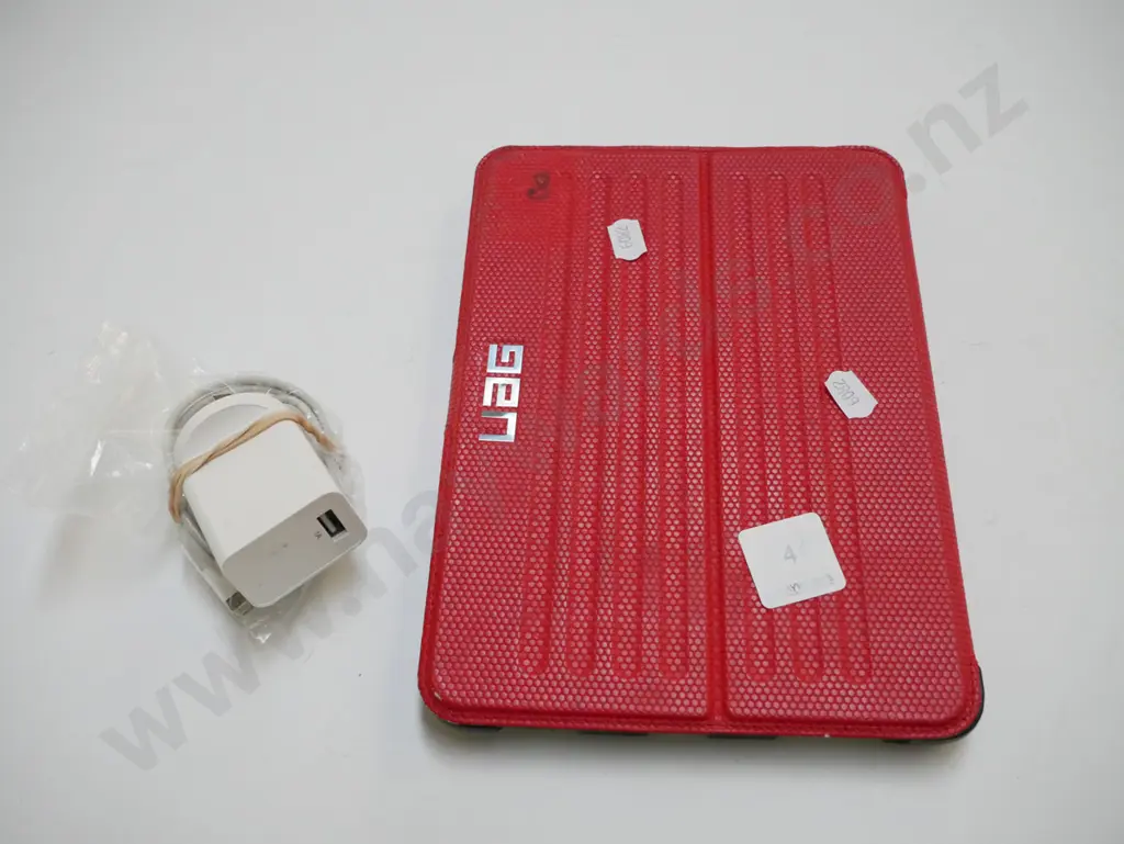 small i-pad and charger Image 1++