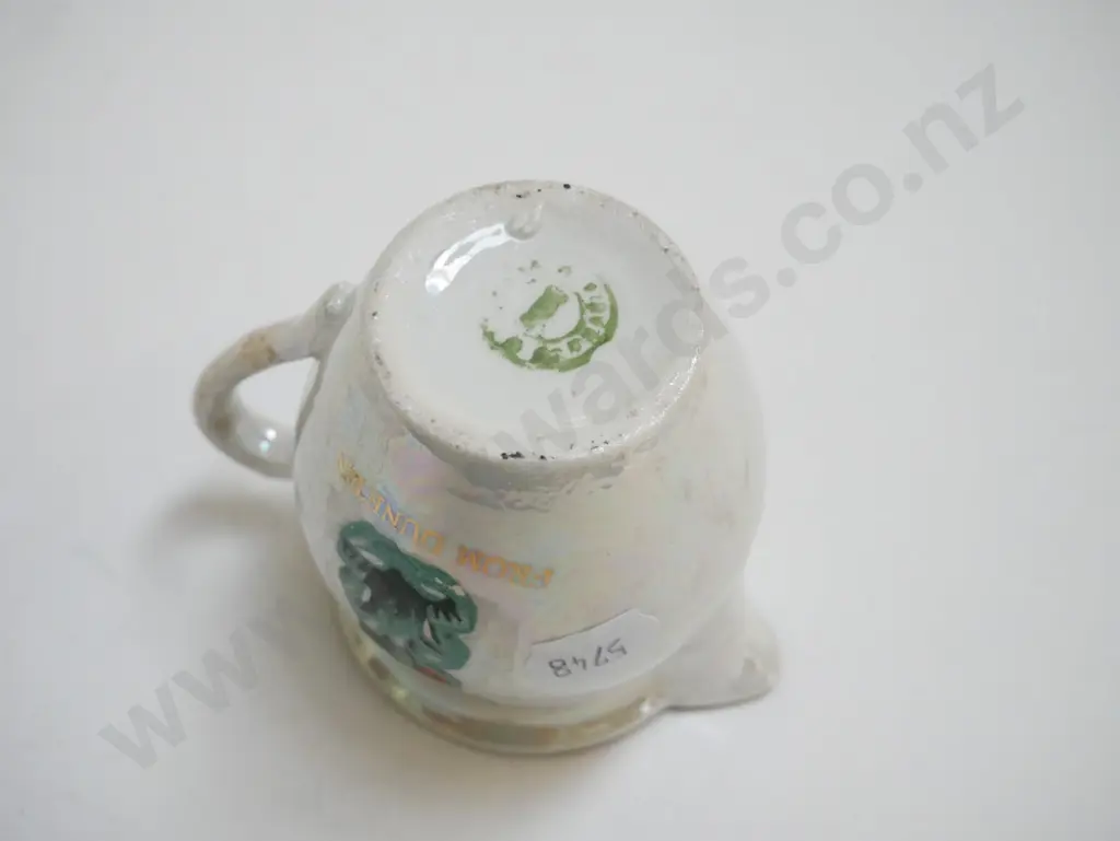Dunedin tiki souvenir creamer Image 1++