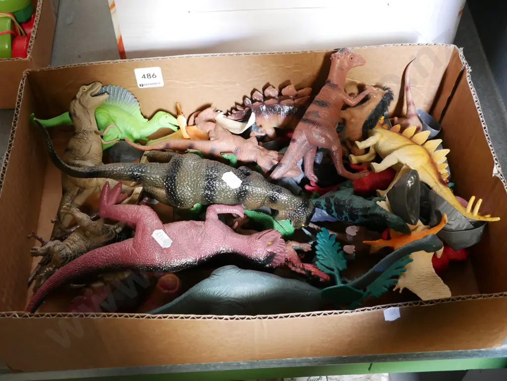 box of plastic dinosaurs Image 1++