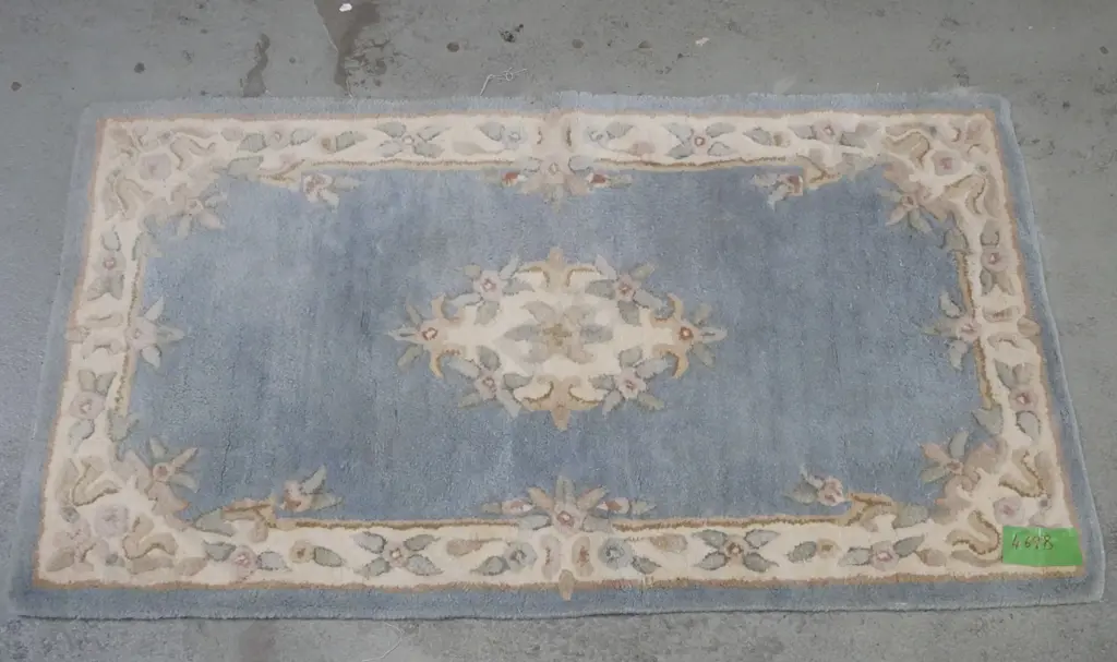 small blue woollen floor mat L-1320 W-750 Image 1++
