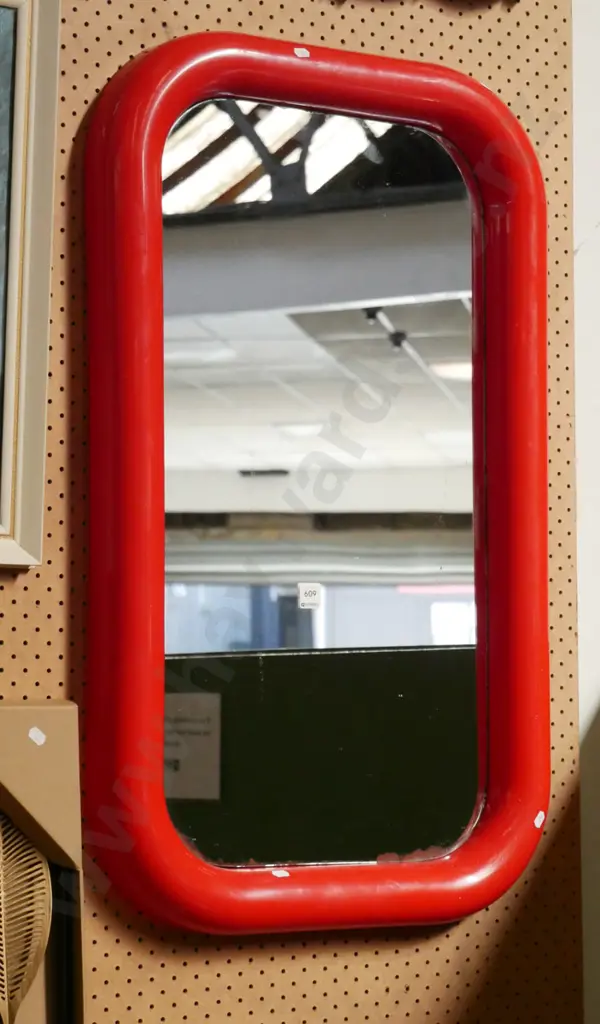early 1980's red plastic framed wall mirror some damager to lower section of glass Image 1++