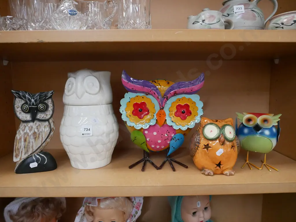 shelf of owl figurines Image 1++