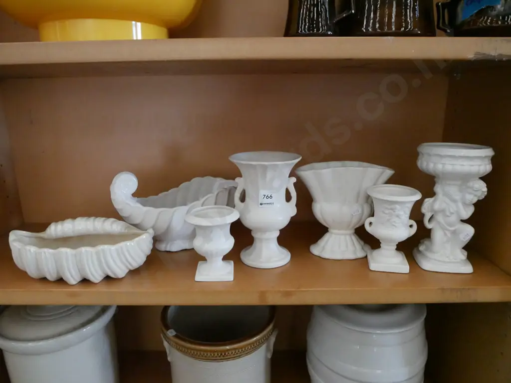 shelf of white vases Image 1++