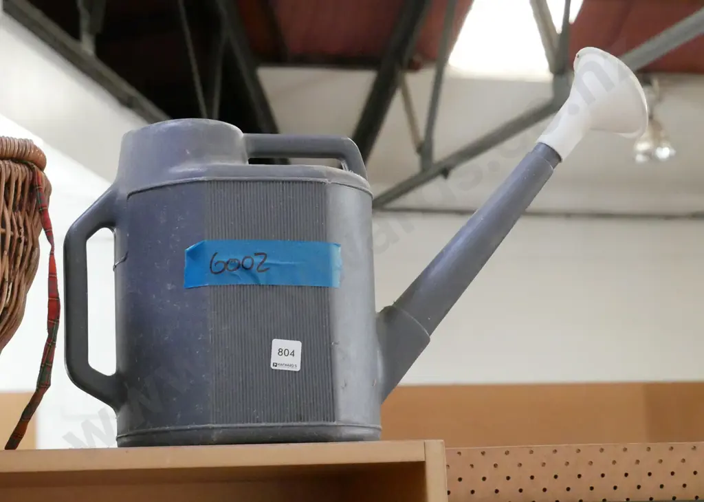 plastic watering can Image 1++