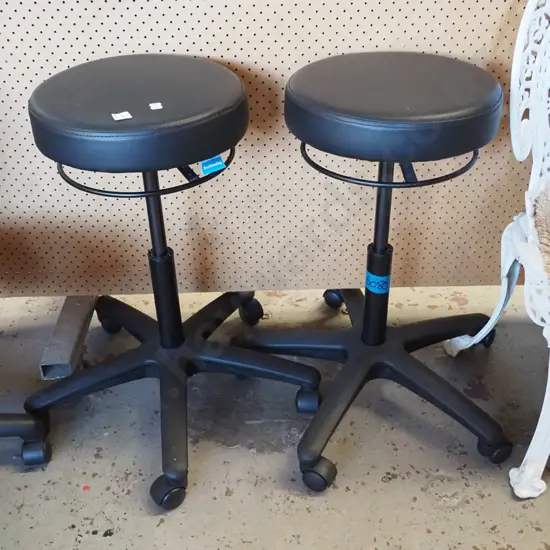 2x black vinyl office stools