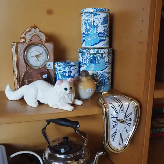 Treasures of the Morning Heirloom porcelain clock, willow pattern storage tins, Dali style clock