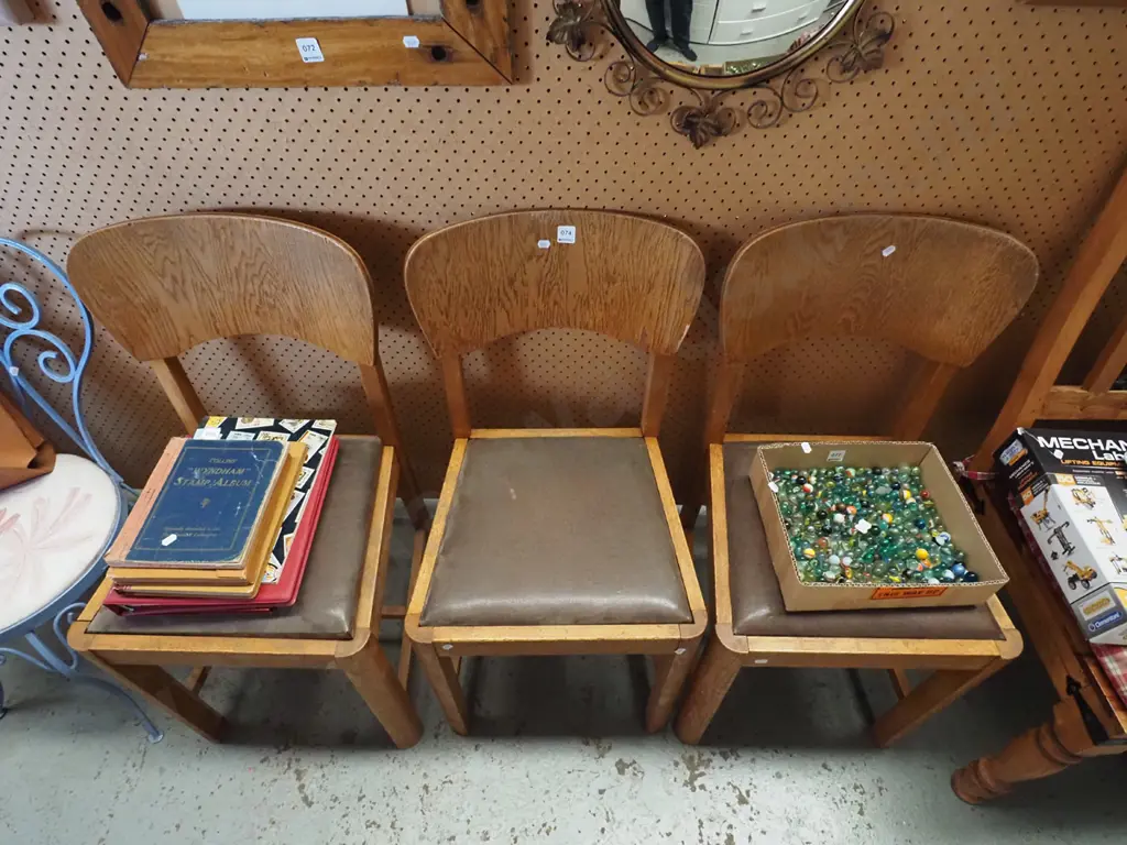 3x brown vinyl and oak plywood dining chairs Image 1++