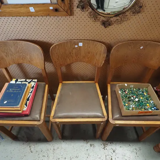 3x brown vinyl and oak plywood dining chairs