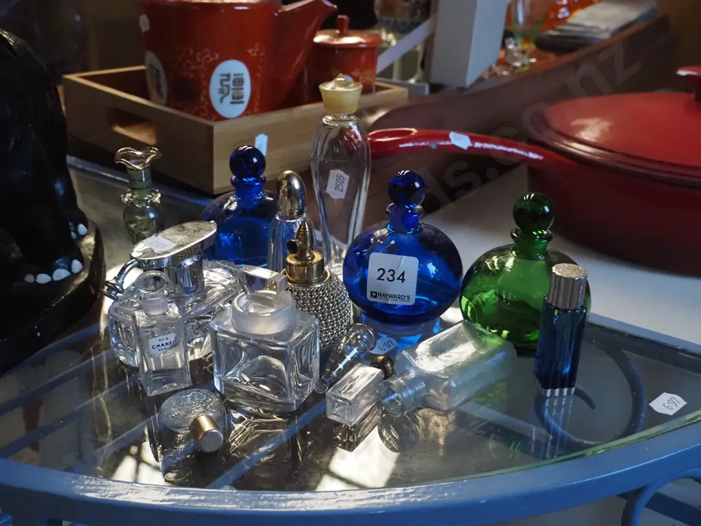assorted glass scent bottles Image 1++