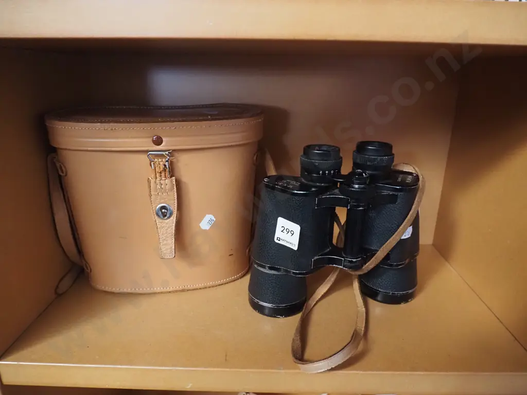 Impakta 12x50 leather cased binoculars Image 1++