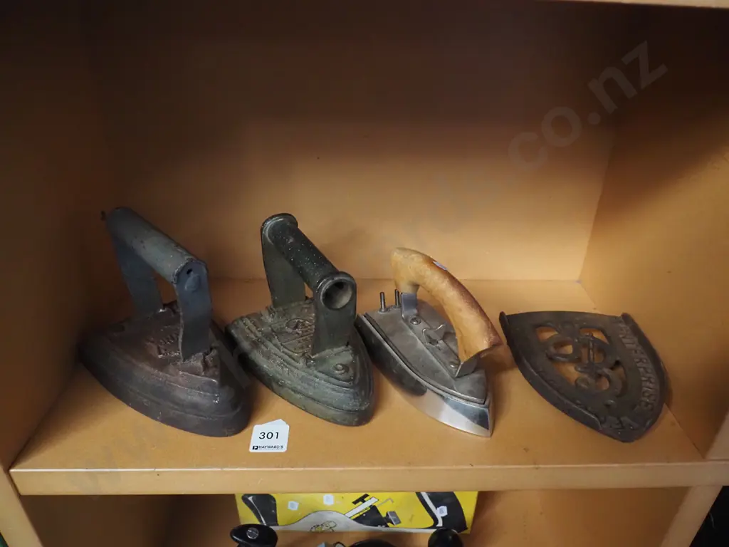 3x sad irons, trivet Image 1++