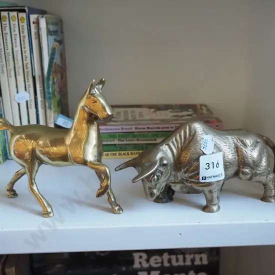 brass bull and horse figurines