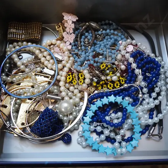 tin of costume jewellery