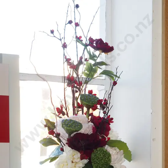 faux flowers in square vase
