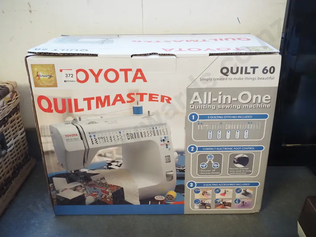boxed Toyota Quiltmaster sewing machine Image 1++