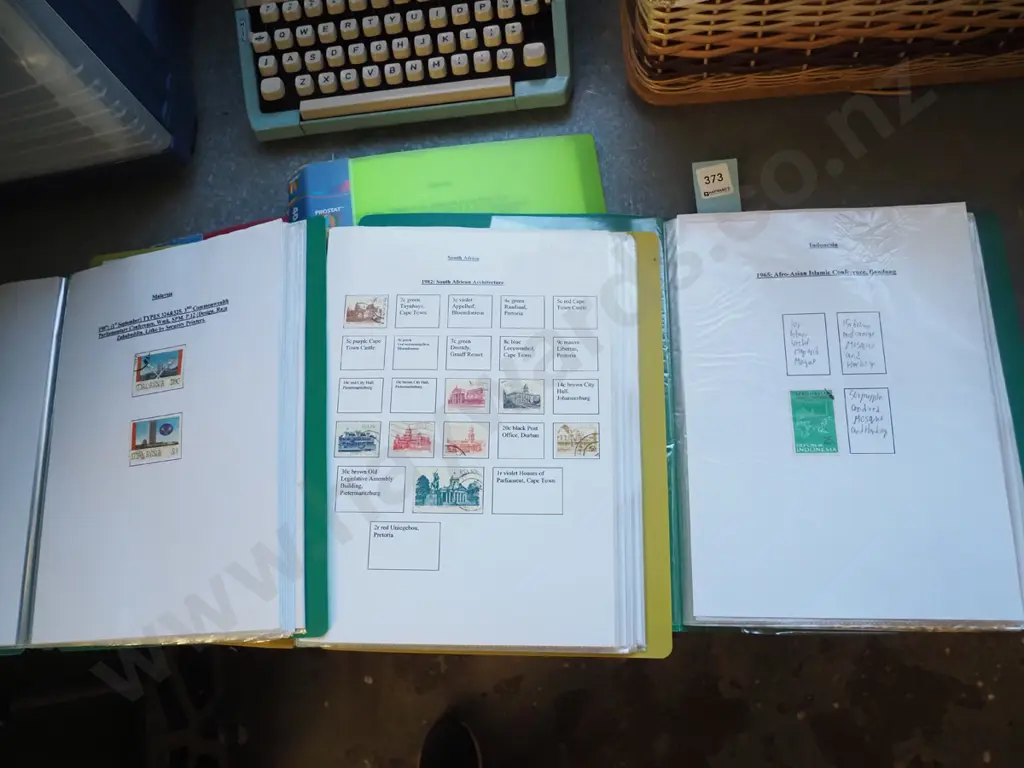 5x clear file folders of stamps Image 1++