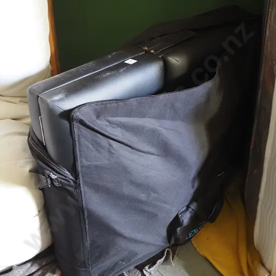 black vinyl massage table