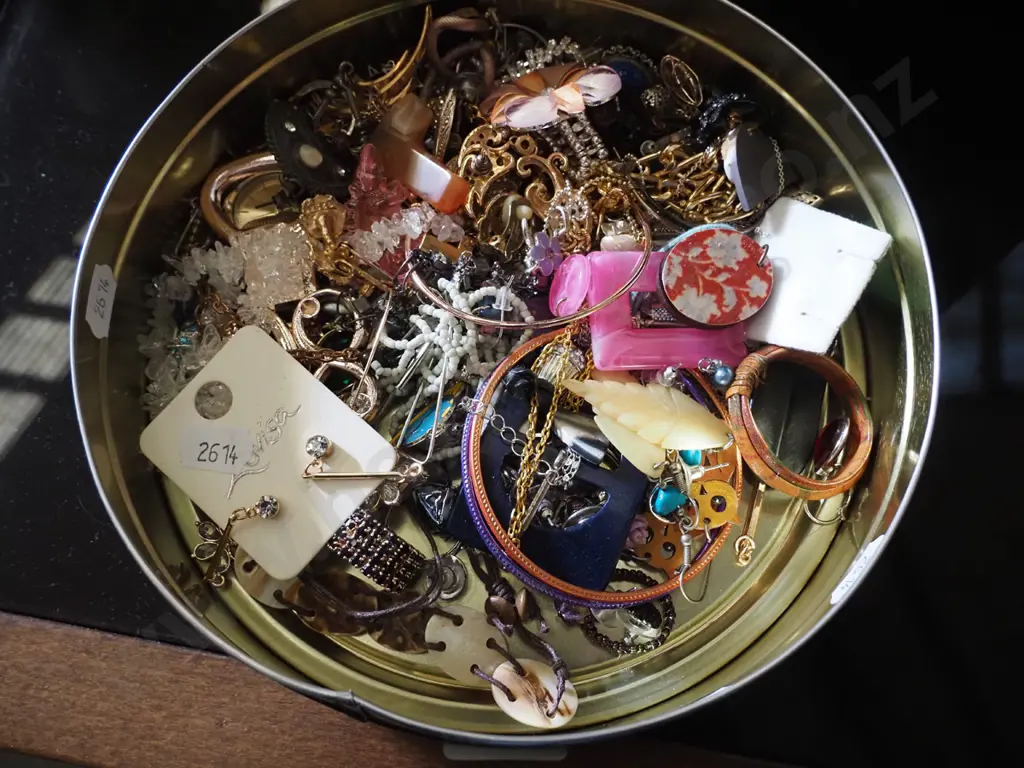 tin of costume jewellery Image 1++
