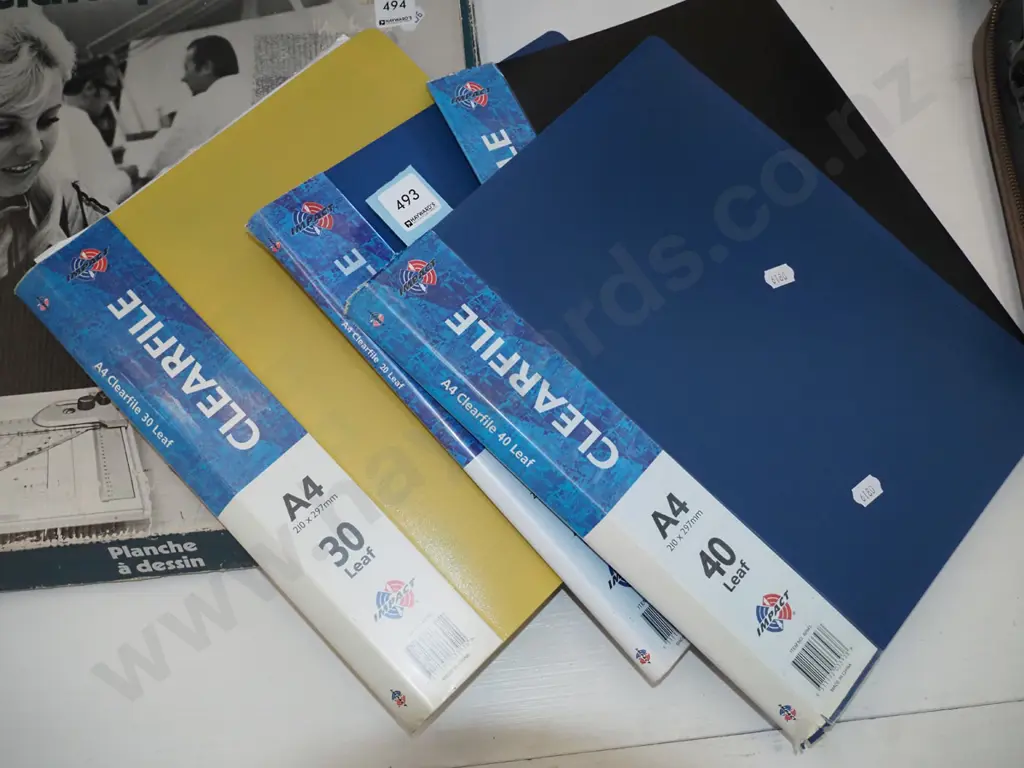 4 clear files of stamps Image 1++