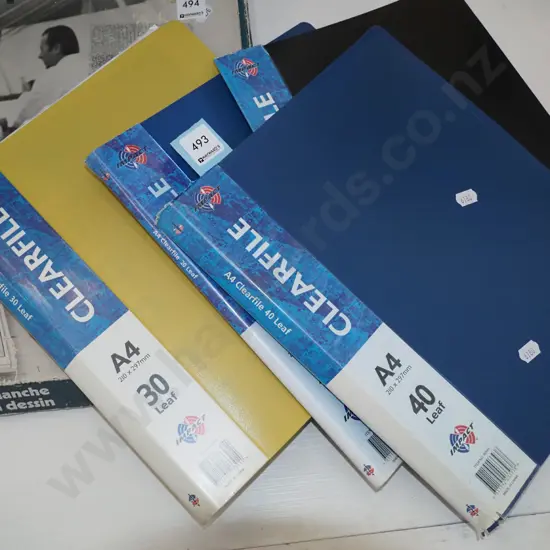 4 clear files of stamps