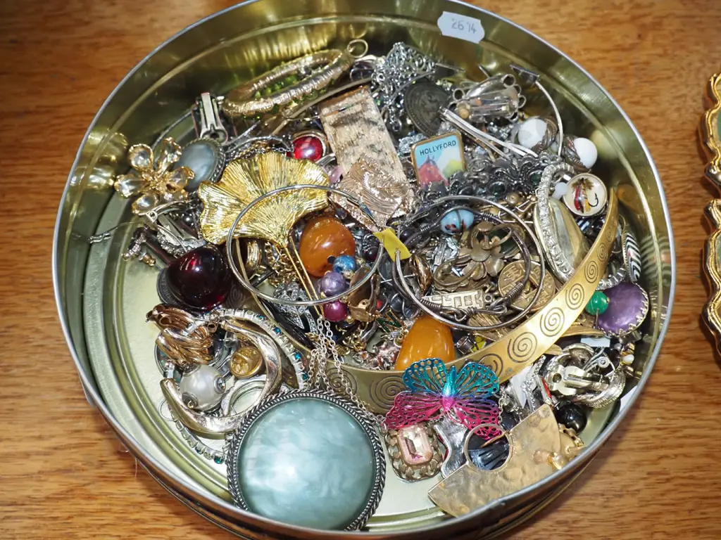 tin of costume jewellery Image 1++
