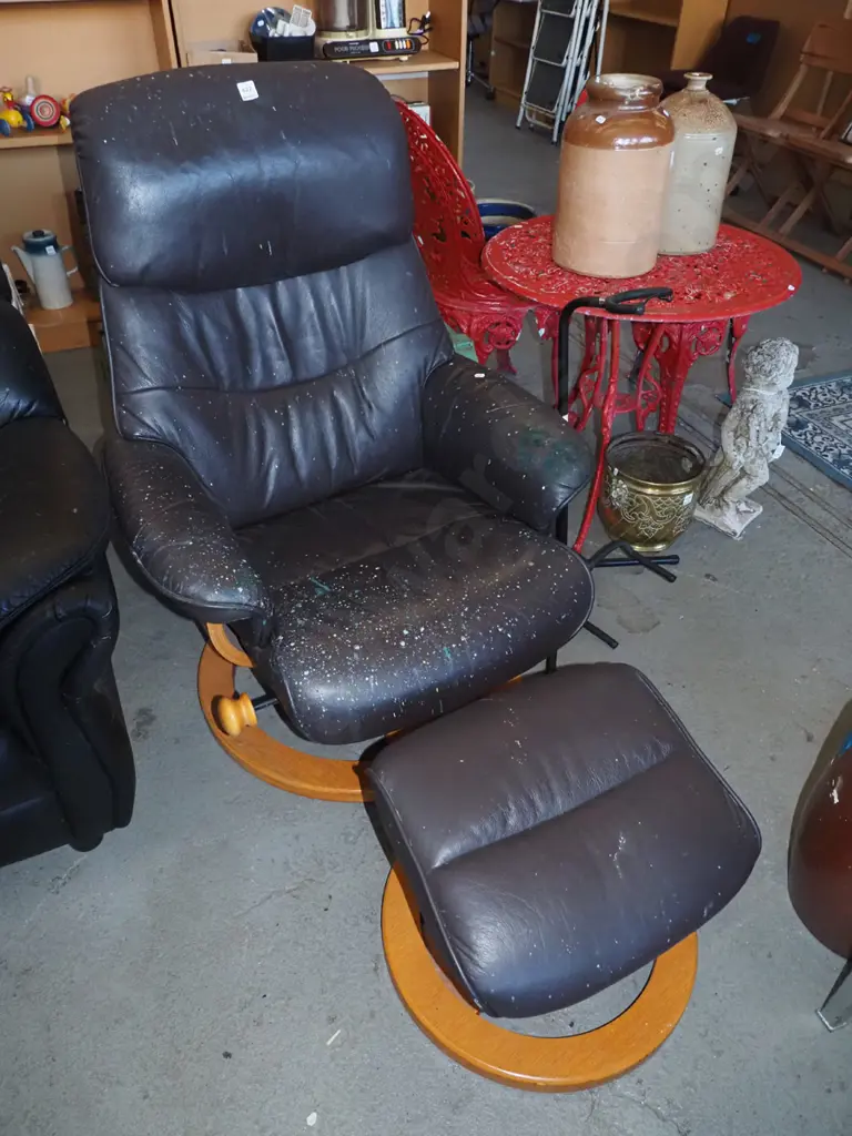 brown vinyl rocker recliner chair with footstool - covered in paint splatters Image 1++
