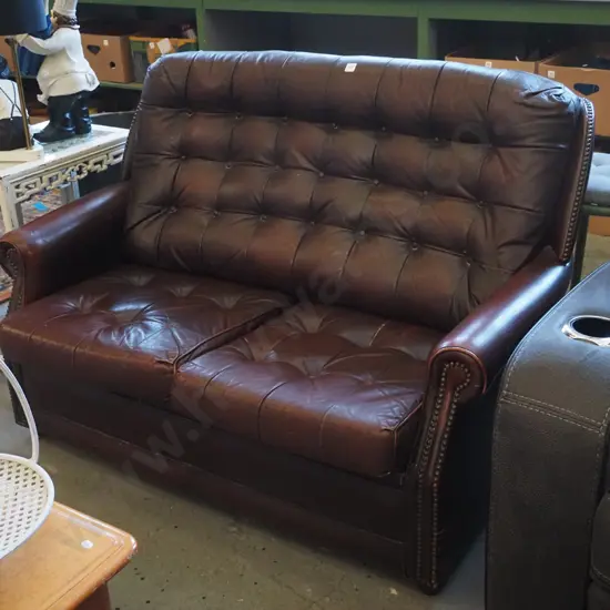brown deep-button leather 2 seater settee
