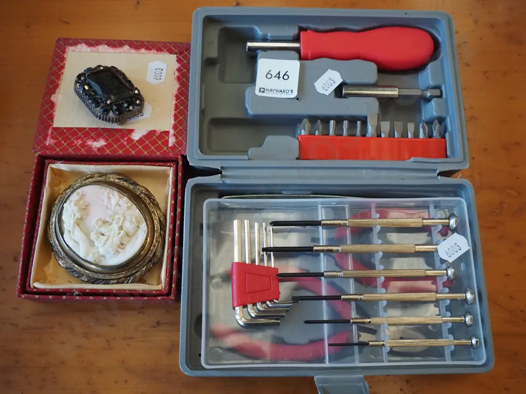 screwdriver and tool set, carved bone brooch, 1 other brooch Image 1++