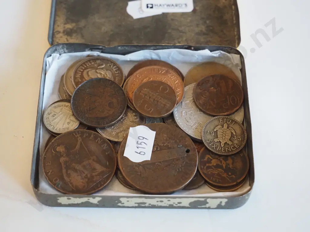 tin of coins Image 1++