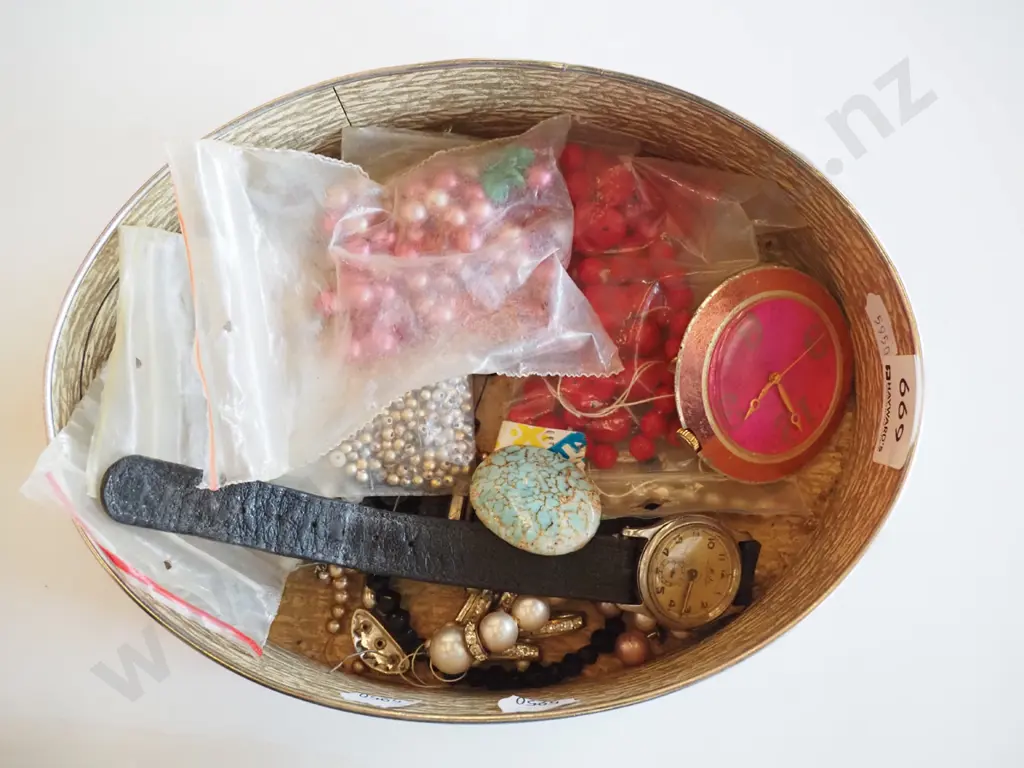 tin of costume jewellery Image 1++