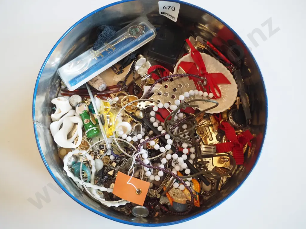tin of costume jewellery Image 1++