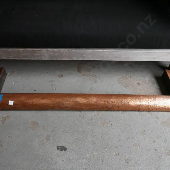 beaten copper and wood hearth edge