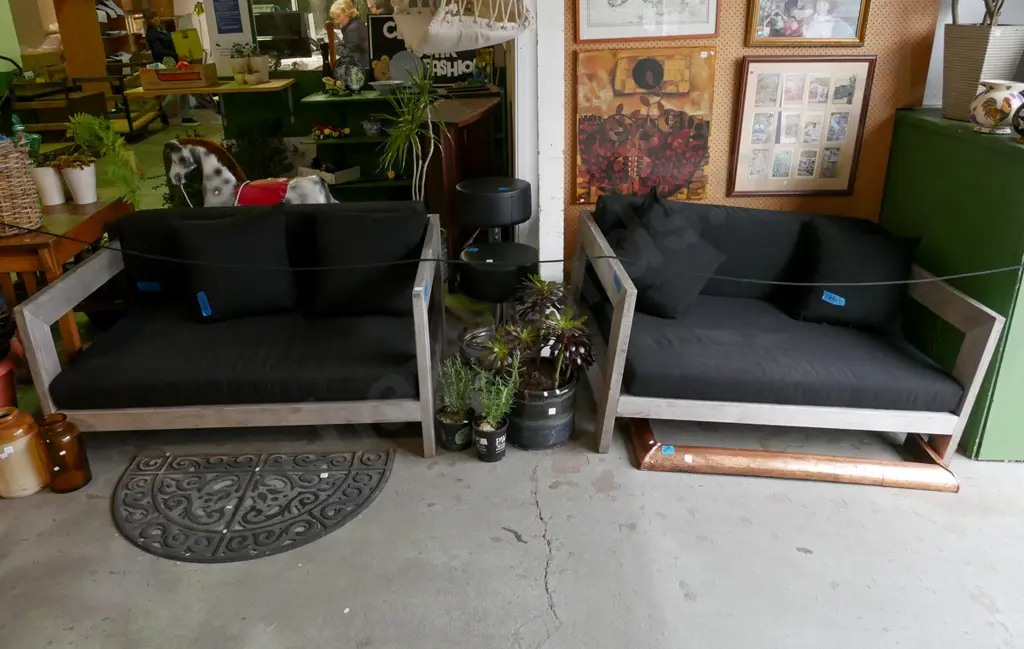 pair of matching outdoor 2 seater couches with removable padding and cushions Image 1++