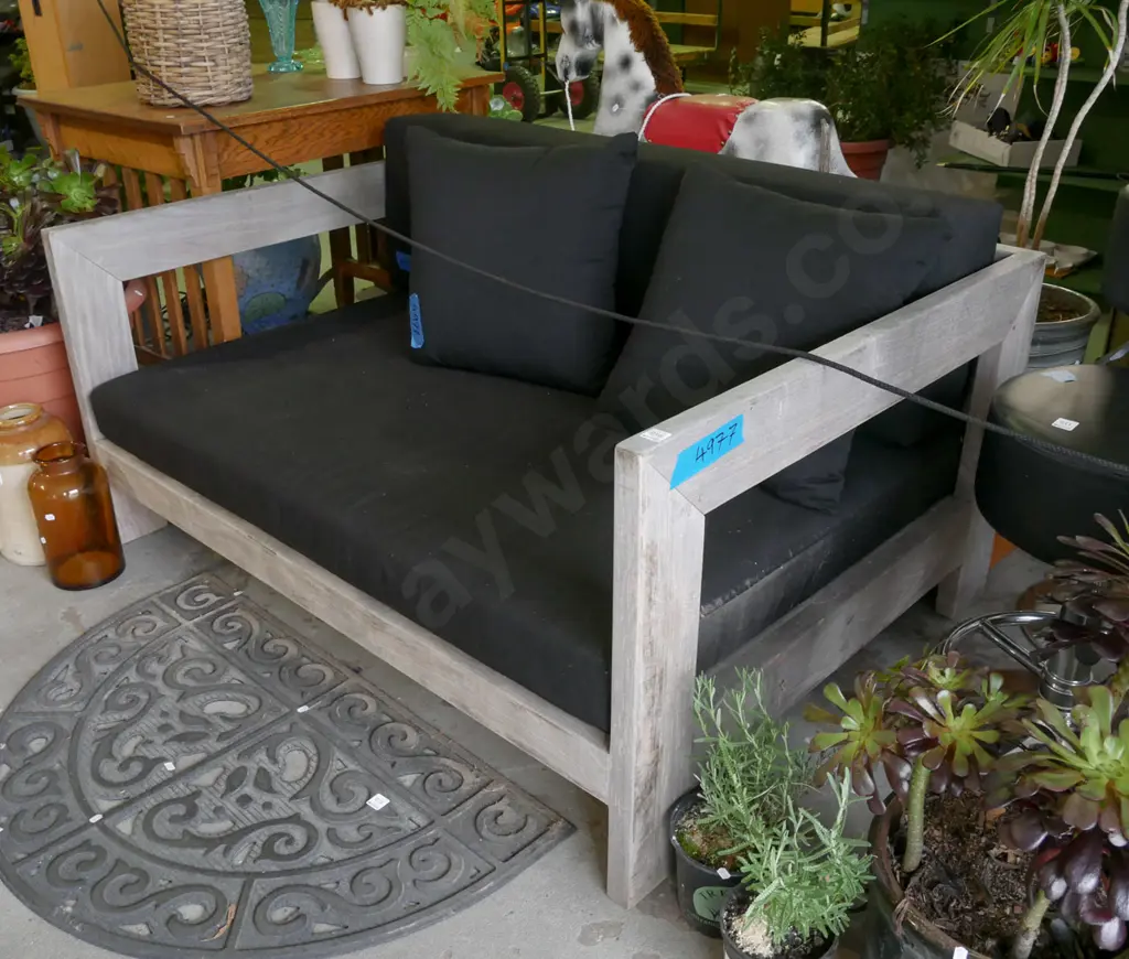 pair of matching outdoor 2 seater couches with removable padding and cushions Image 1++