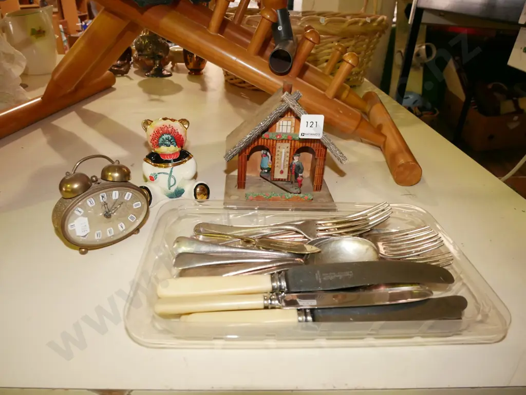 Swiss chalet thermometer, cutlery, bear figurine, travel alarm clock Image 1++