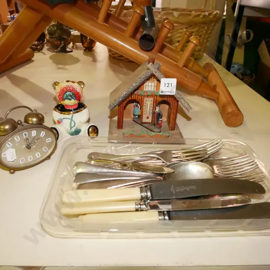 Swiss chalet thermometer, cutlery, bear figurine, travel alarm clock