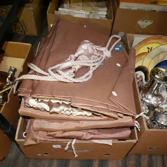 box of brown curtains