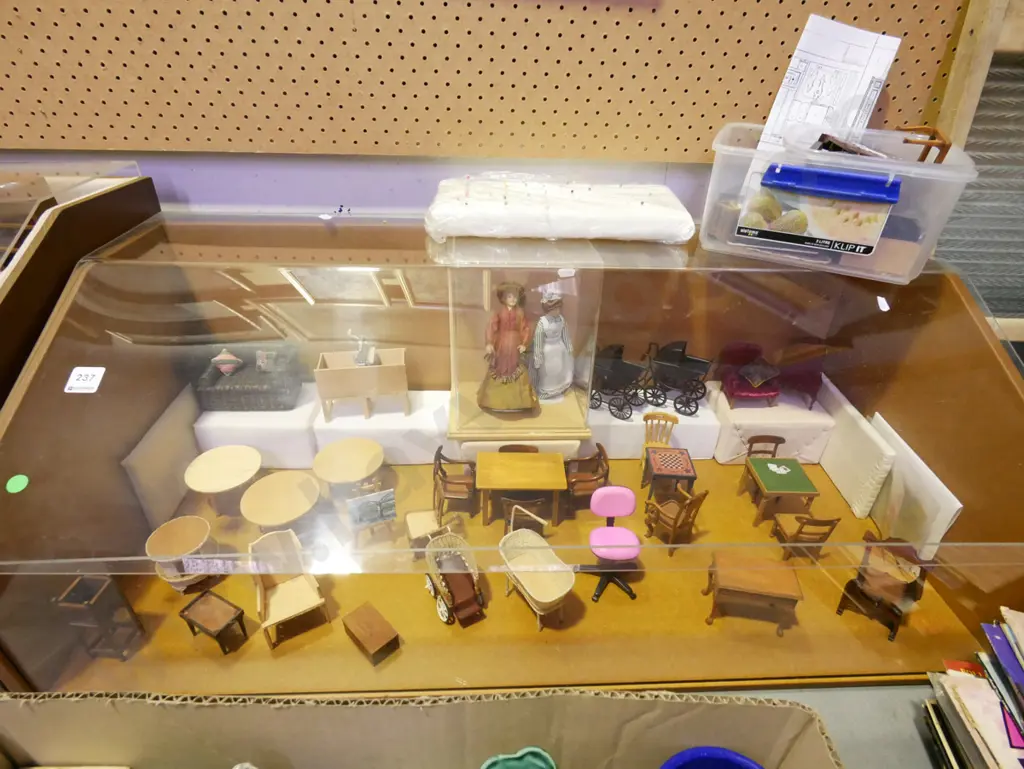 2x perspex cabinets filled with dolls house furniture, dolls, plastic tub of unfinished and damaged furniture Image 1++