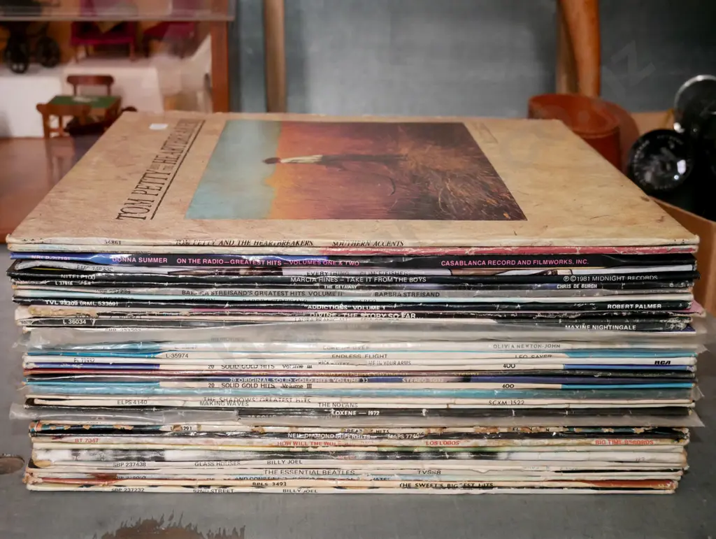 stack of LPs; Tom Petty, Donna Summer etc Image 1++