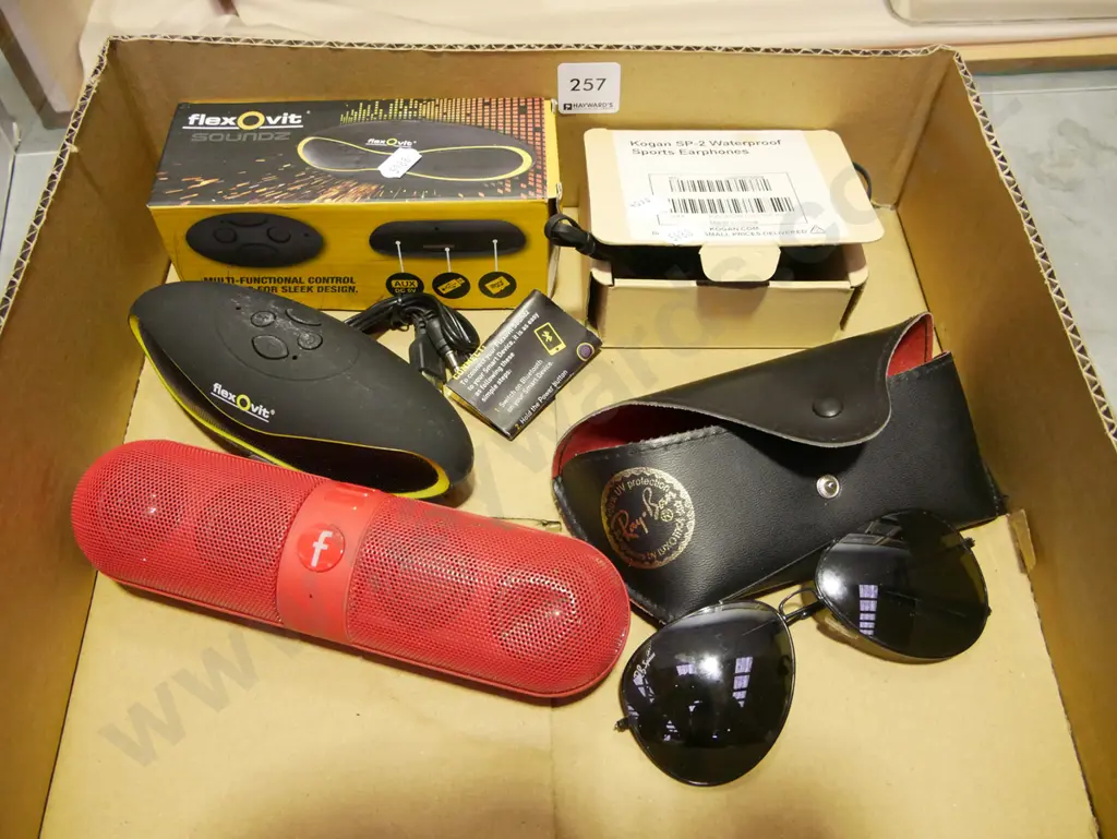 box; sunglasses, waterproof headphones, 2x speakers Image 1++