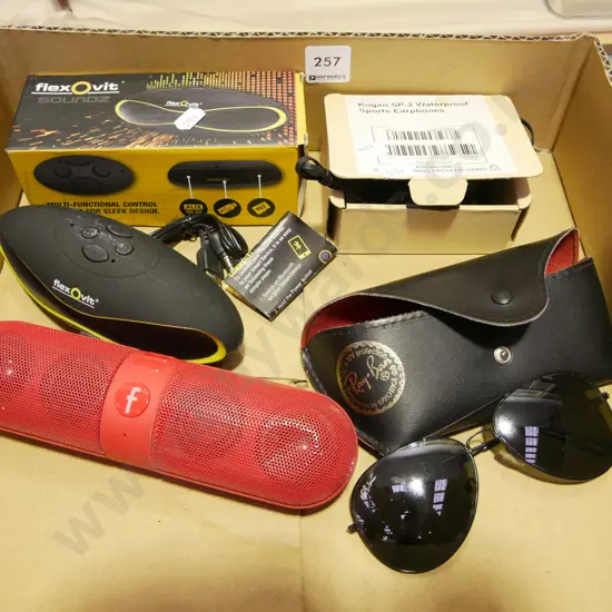 box; sunglasses, waterproof headphones, 2x speakers