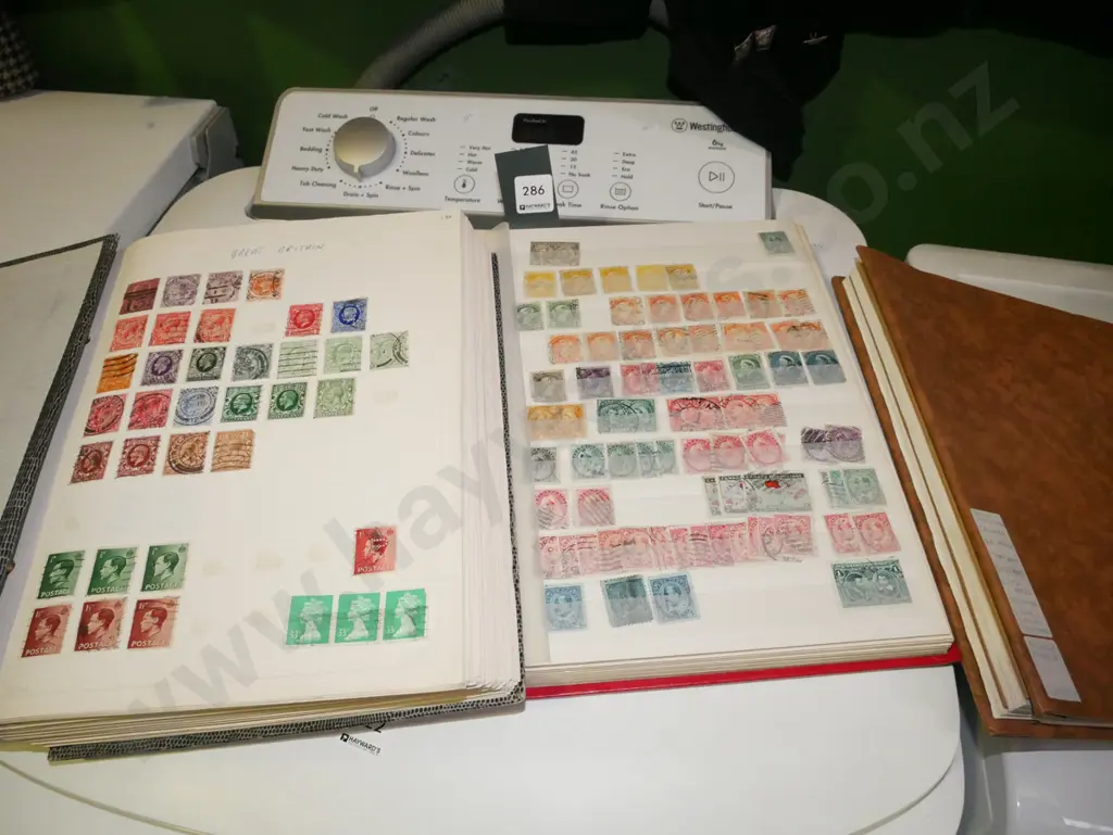 4x stamp albums Image 1++