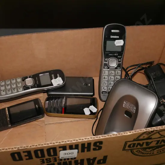 box; 2x Uniden phones,  cell phones
